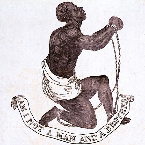 Medalhão de Wedgwood, onde se lê, em inglês: "Não sou eu um homem e um irmão?". Imagem obtida de [Wikimedia Commons](https://en.wikipedia.org/wiki/File:Official_medallion_of_the_British_Anti-Slavery_Society_(1795).jpg) / [Domínio público](https://pt.wikipedia.org/wiki/Domínio_público).
